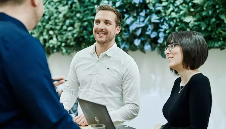 Employees in conversation