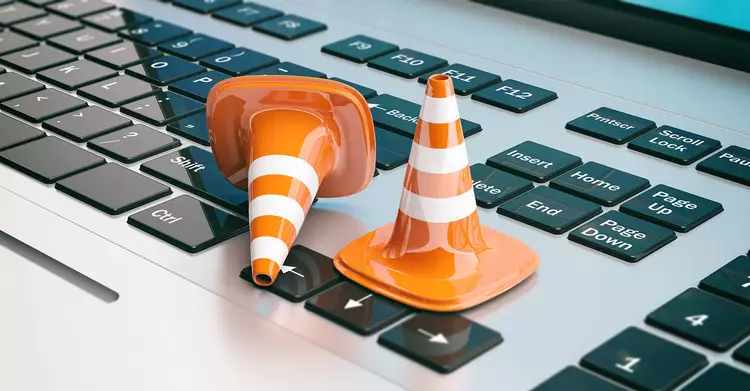 Guide cones on a keyboard symbolize that there is still work to be done in terms of digitization.